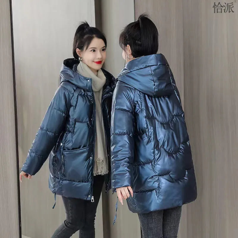 Women's loose thick hooded winter jacket in blue, showing front view with long sleeves.