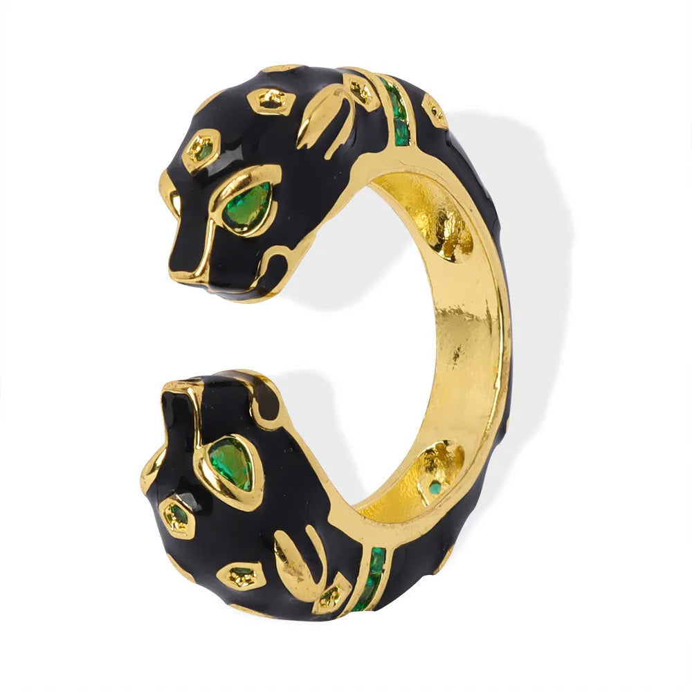 Black cheetah print geometric open ring on finger showing electroplated copper construction