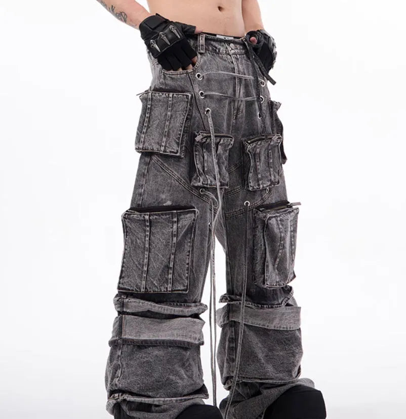 Grey distressed cotton denim men's overalls with rope stitching on the legs.