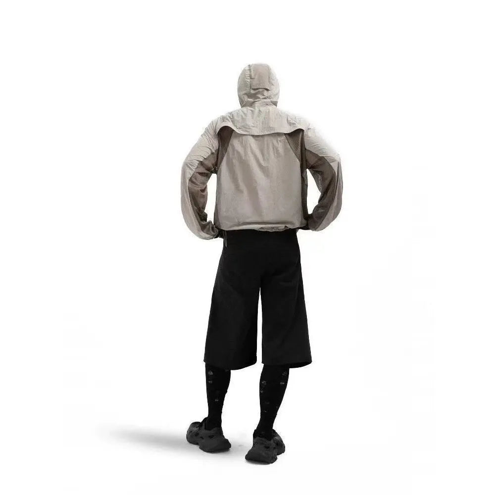 Mesh stitching thin sun protective clothing in desert brown colour showing regular length cut and lightweight construction