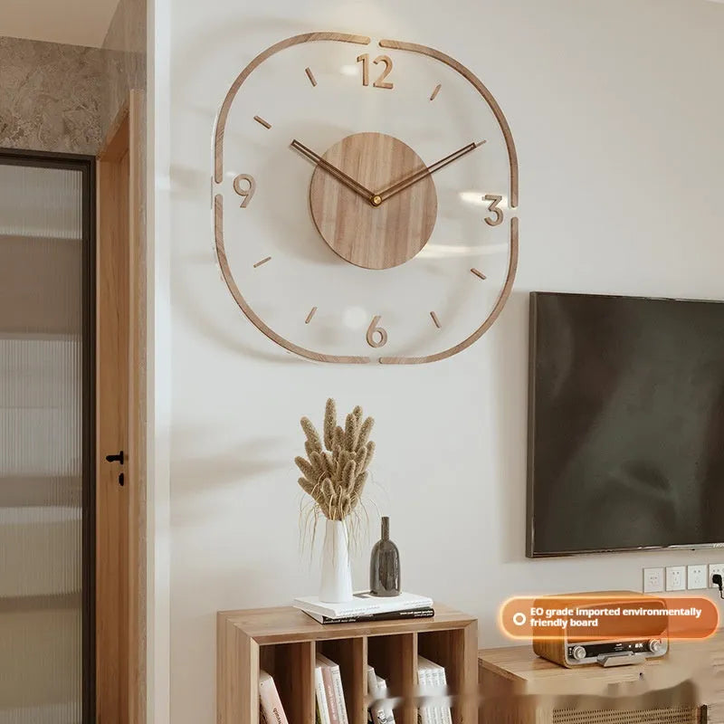Modern square transparent wooden frame wall clock on a wall, showing visible mechanical movement inside.