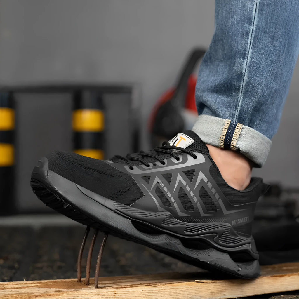 Black steel toe cap labour protection shoes with lace-up front and flat knitted uppers.