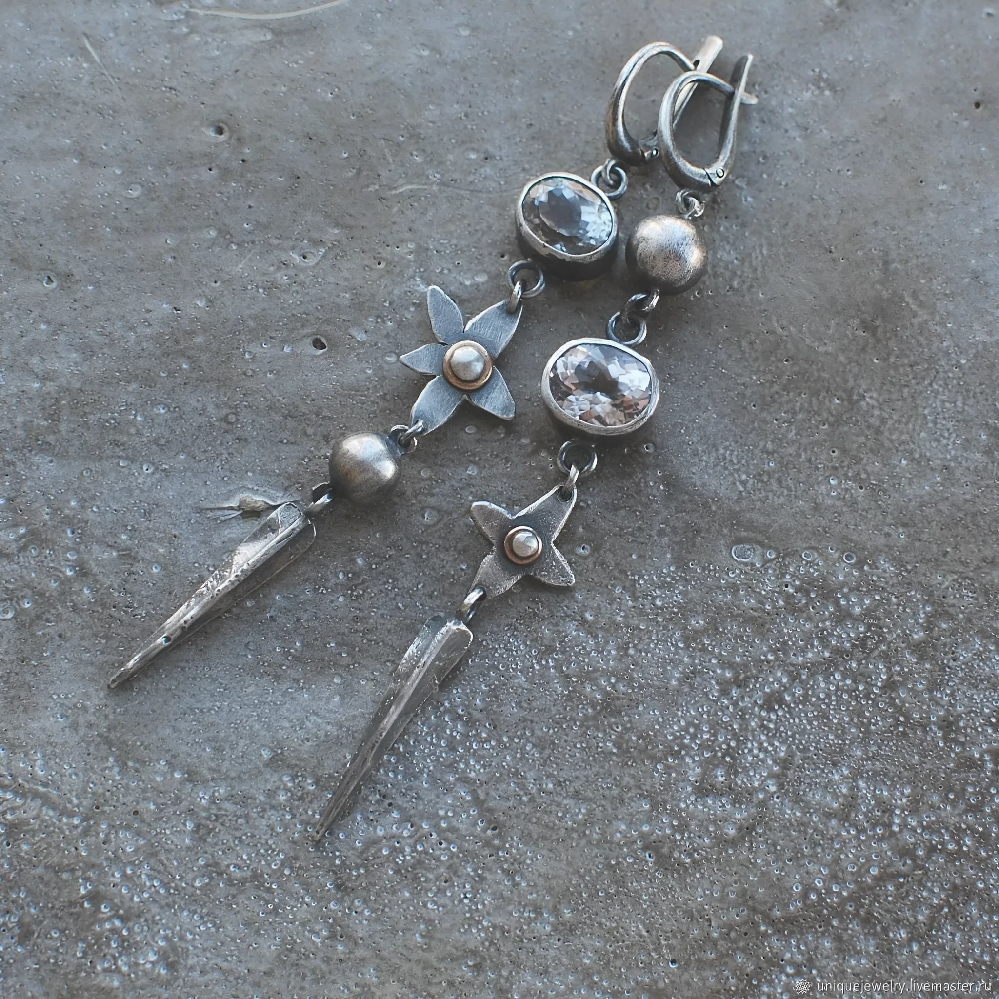 Long geometric XINGX design pendant earrings in antique silver tone with rhinestones.