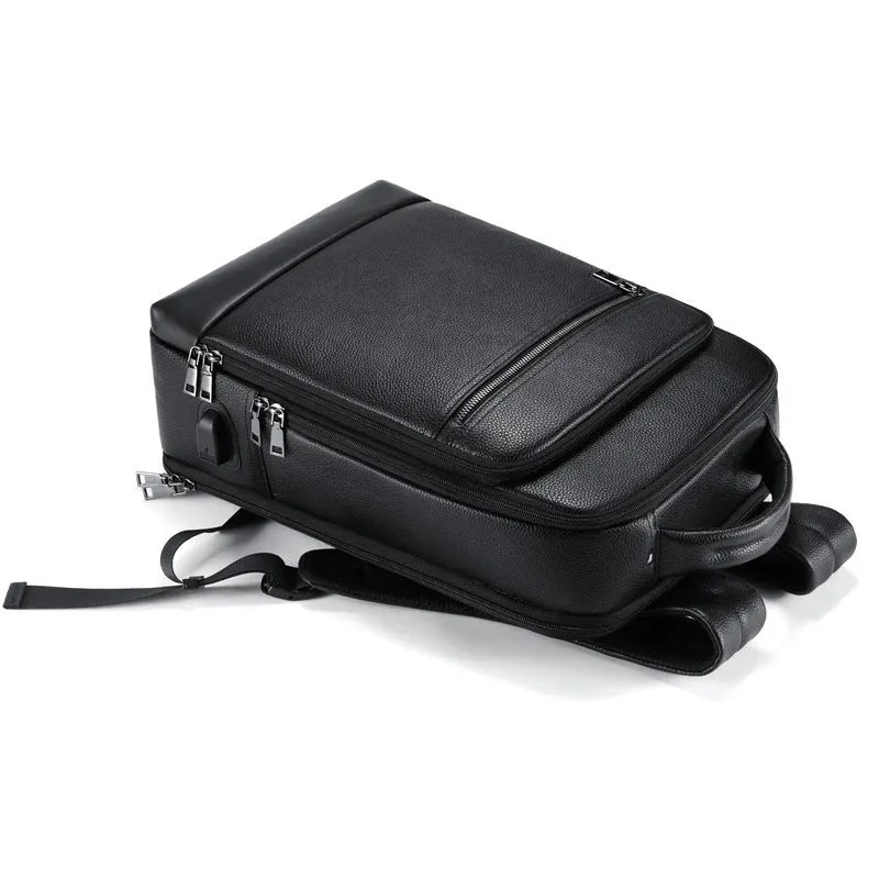 Black genuine leather men's business backpack with curved straps and a professional design.