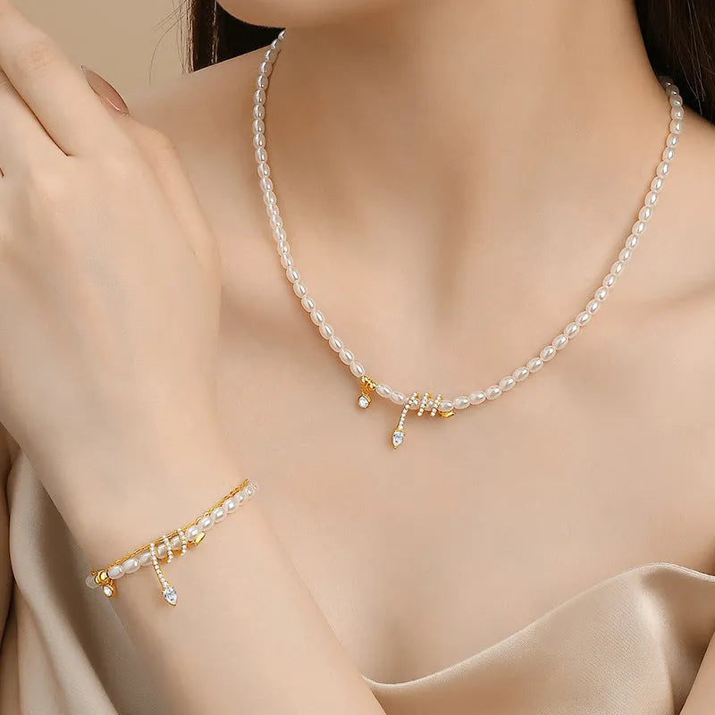 Pearl Snake 925 silver bracelet with snake charm, available in gold or white gold electroplated finish.