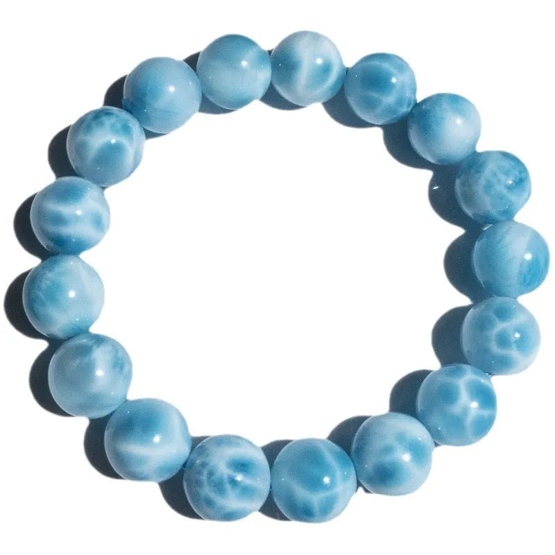 Handcrafted Bodhi bead bracelet with natural crystal sea-pattern stones and pearl accents in Maillard style