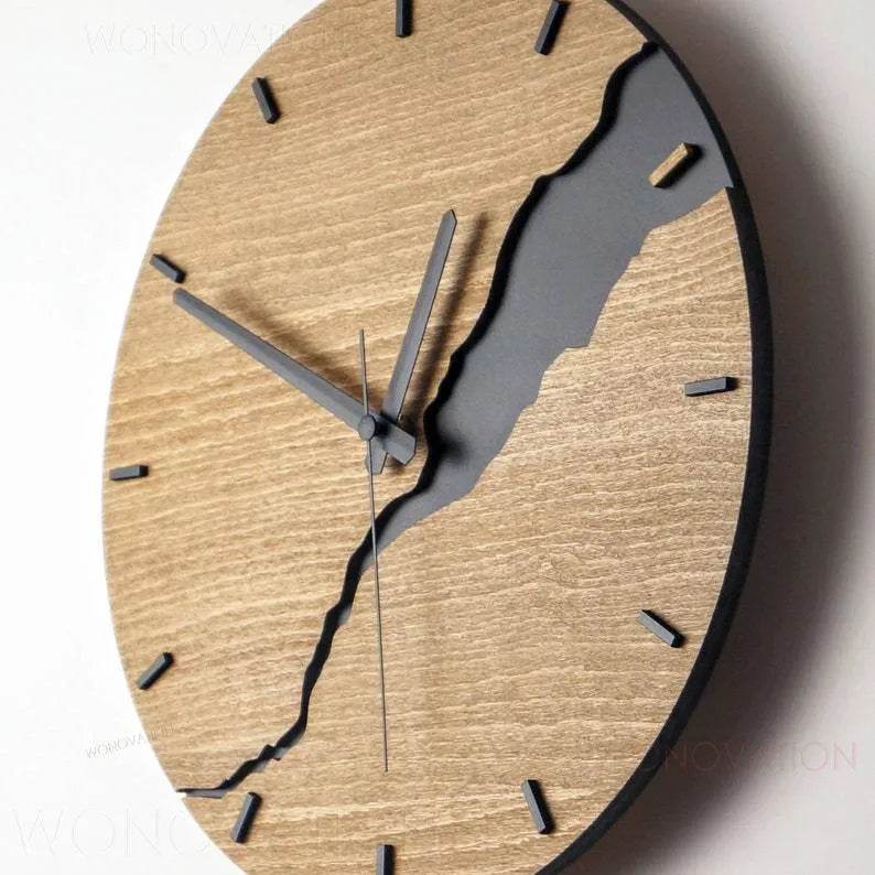 Modern wooden wall clock with creative crack design on a simple shell.