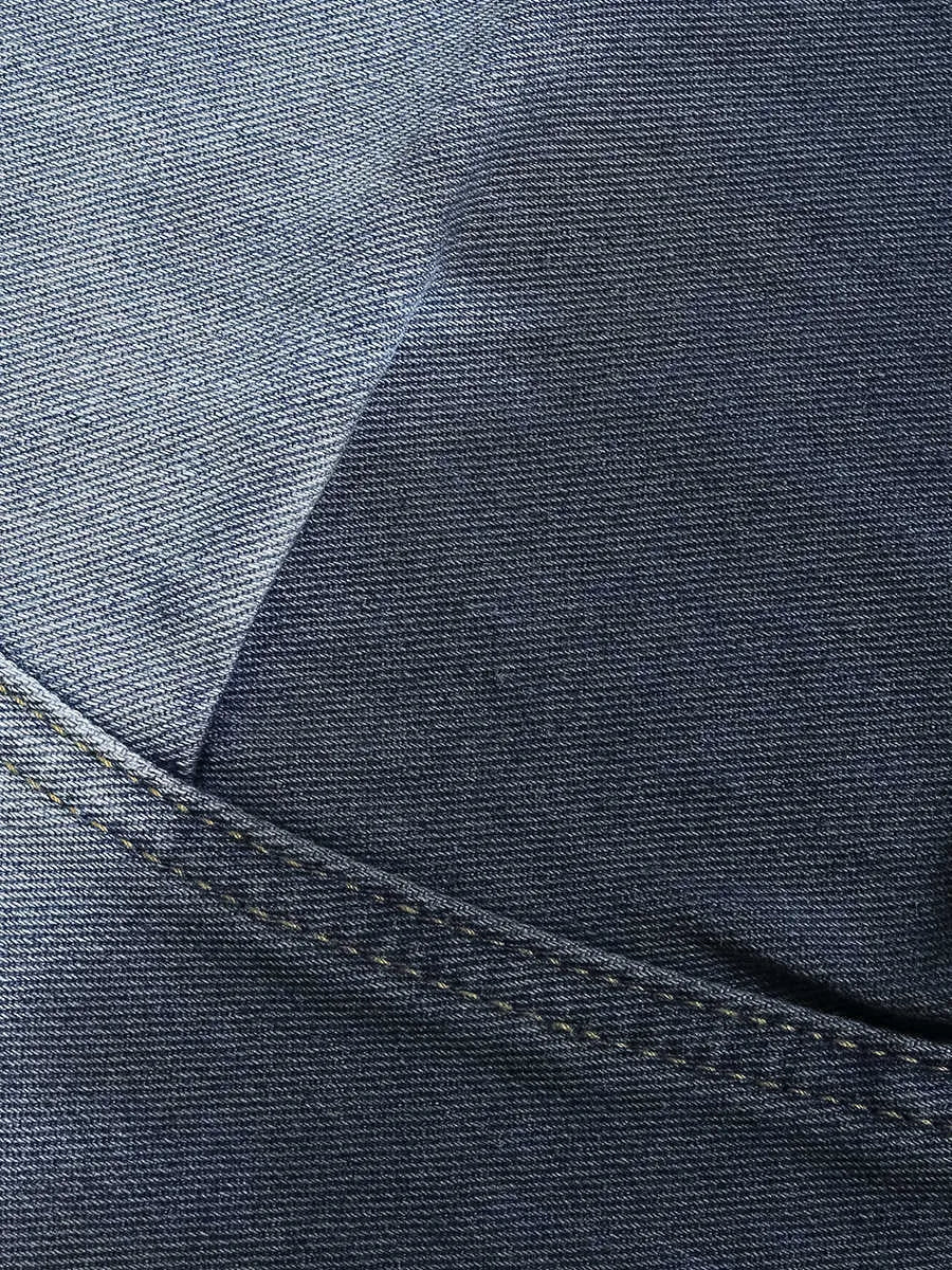 Blue tie-dye gradient cropped jeans with a loose fit and washed-out, worn-looking finish.