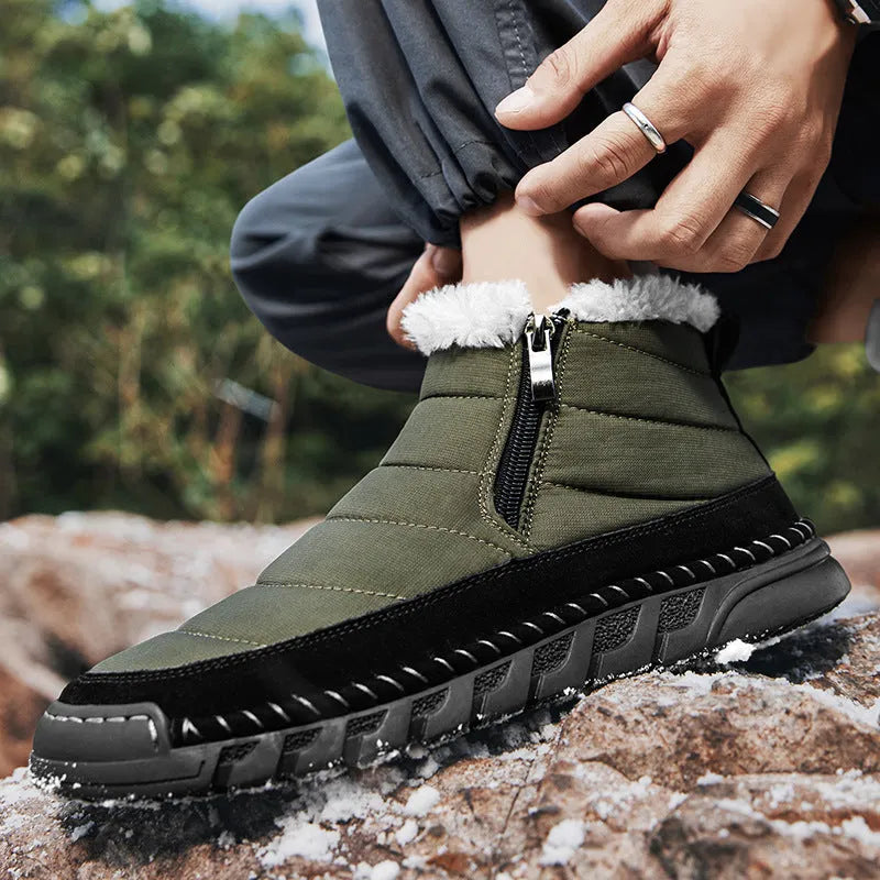 Men's green plus size snow boot with round toe, flat heel, and non-slip rubber sole.