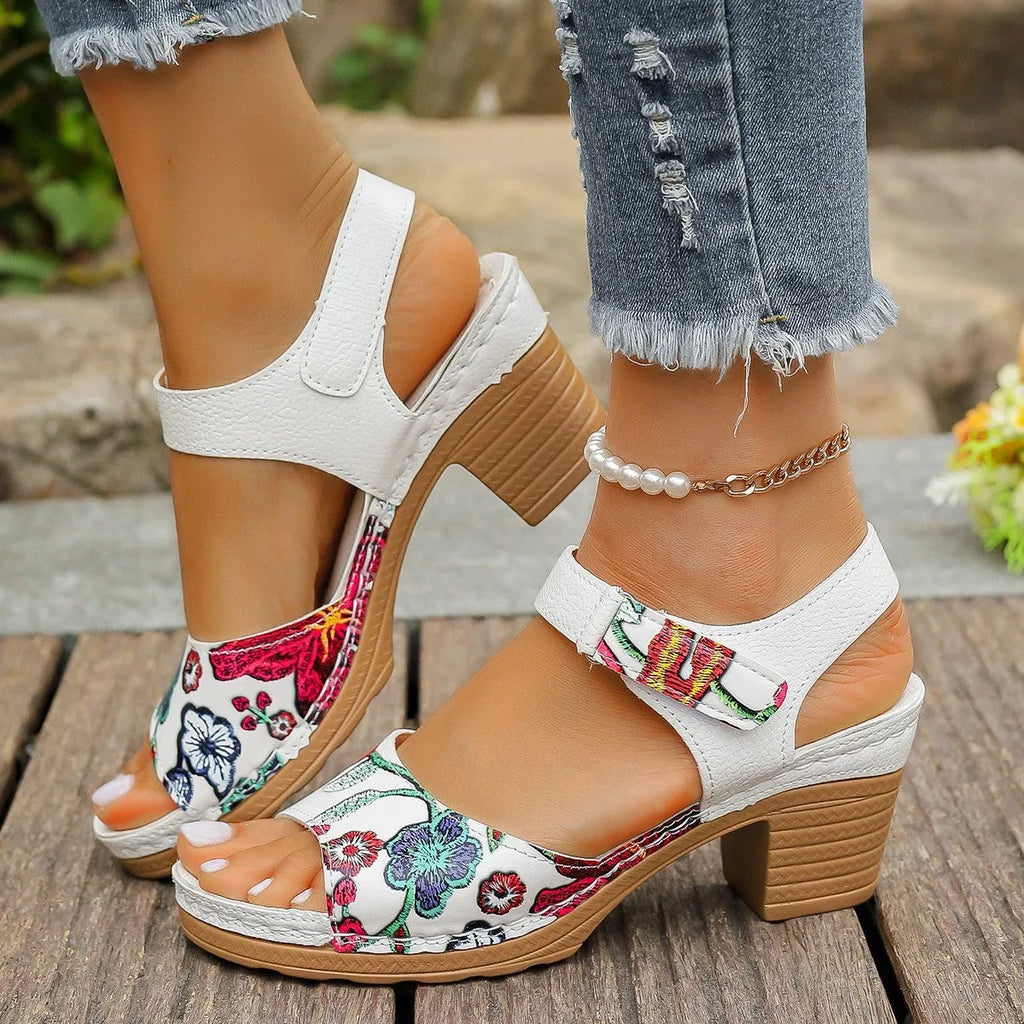 White women's high heel sandals with adjustable Velcro buckle fastening and rubber sole