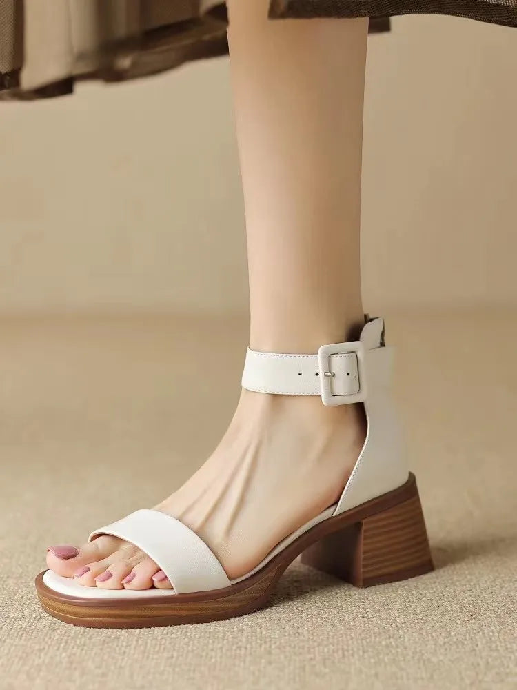 Women's white platform high heels with ankle strap and round toe design