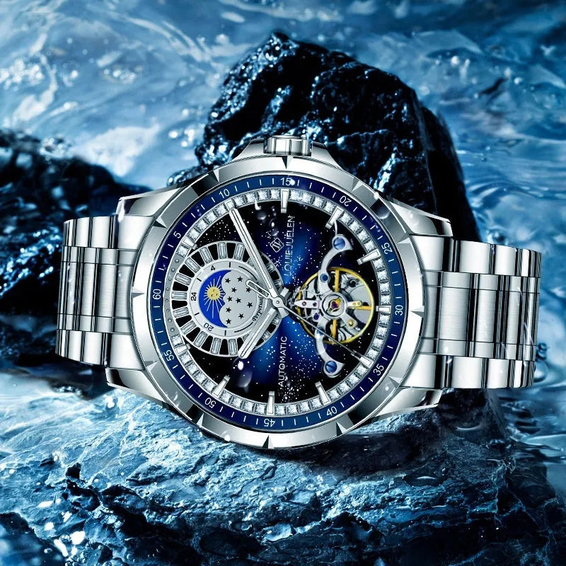 Silver alloy case automatic mechanical watch with blue dial, stainless steel strap, and transparent case back for men