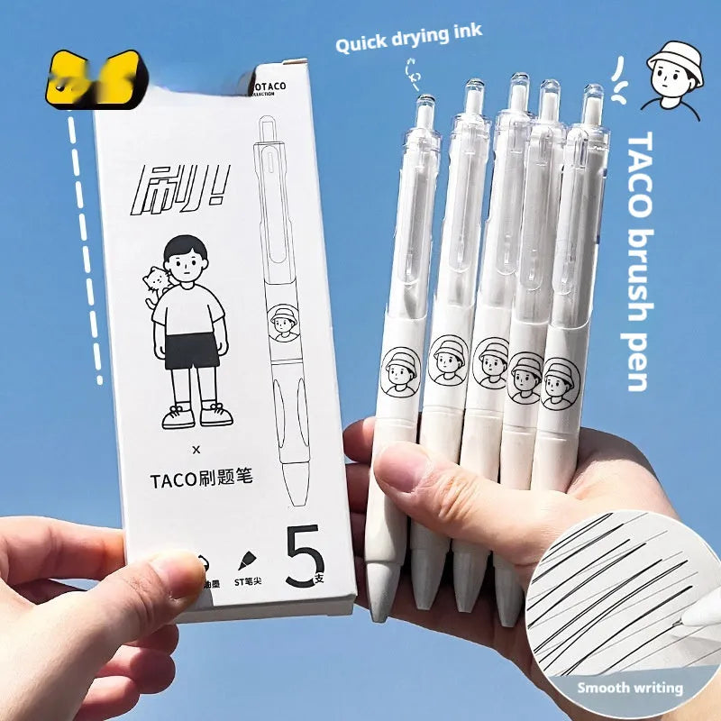Five Taco brand ballpoint pens with 0.5mm black ink refills arranged together