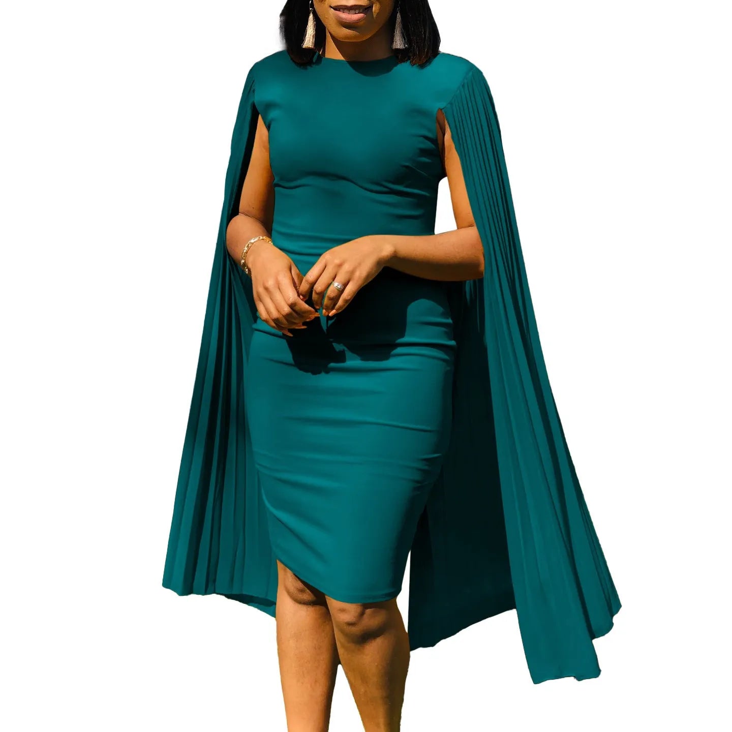 Pleated shawl style evening gown with round neck and long sleeves in formal setting