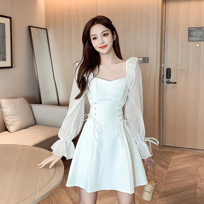 White long sleeve dress with chiffon patchwork detail and waist-slimming cut for women