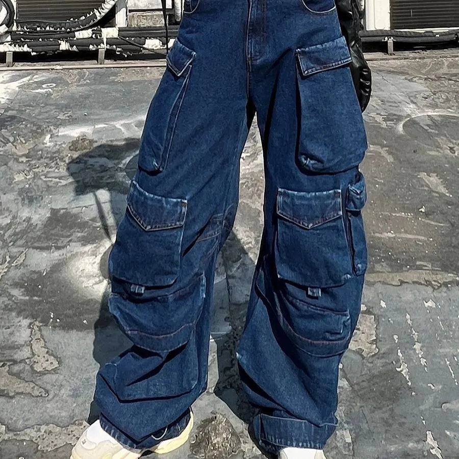 Dark blue distressed wide-leg high-waist jeans with multiple pockets on a mannequin.