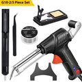 Black G102 soldering gun with LED light, part of a five-piece tool kit on a workbench