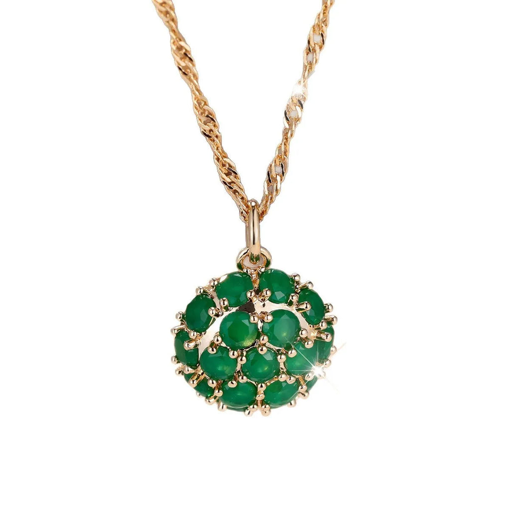 Round green jade pendant with diamond setting on champagne gold chain necklace