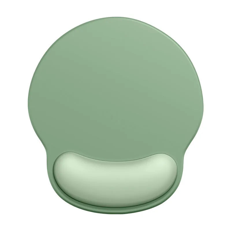 Silicone mouse mat with attached wristband in gradient colour pattern on desk