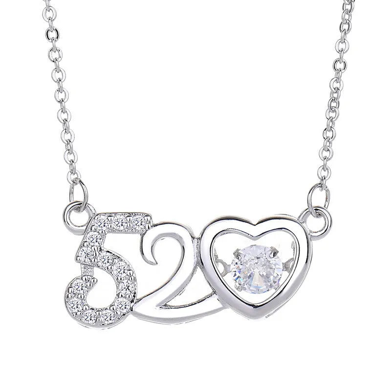 Copper heart-shaped pendant necklace with crown and bow details in rose gold or silver colour