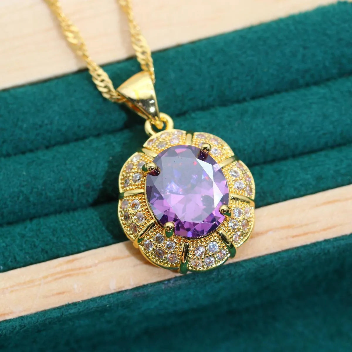 18k gold plated jewellery set with multi-colour cubic zirconia stones including necklace, earrings, ring, and bracelet