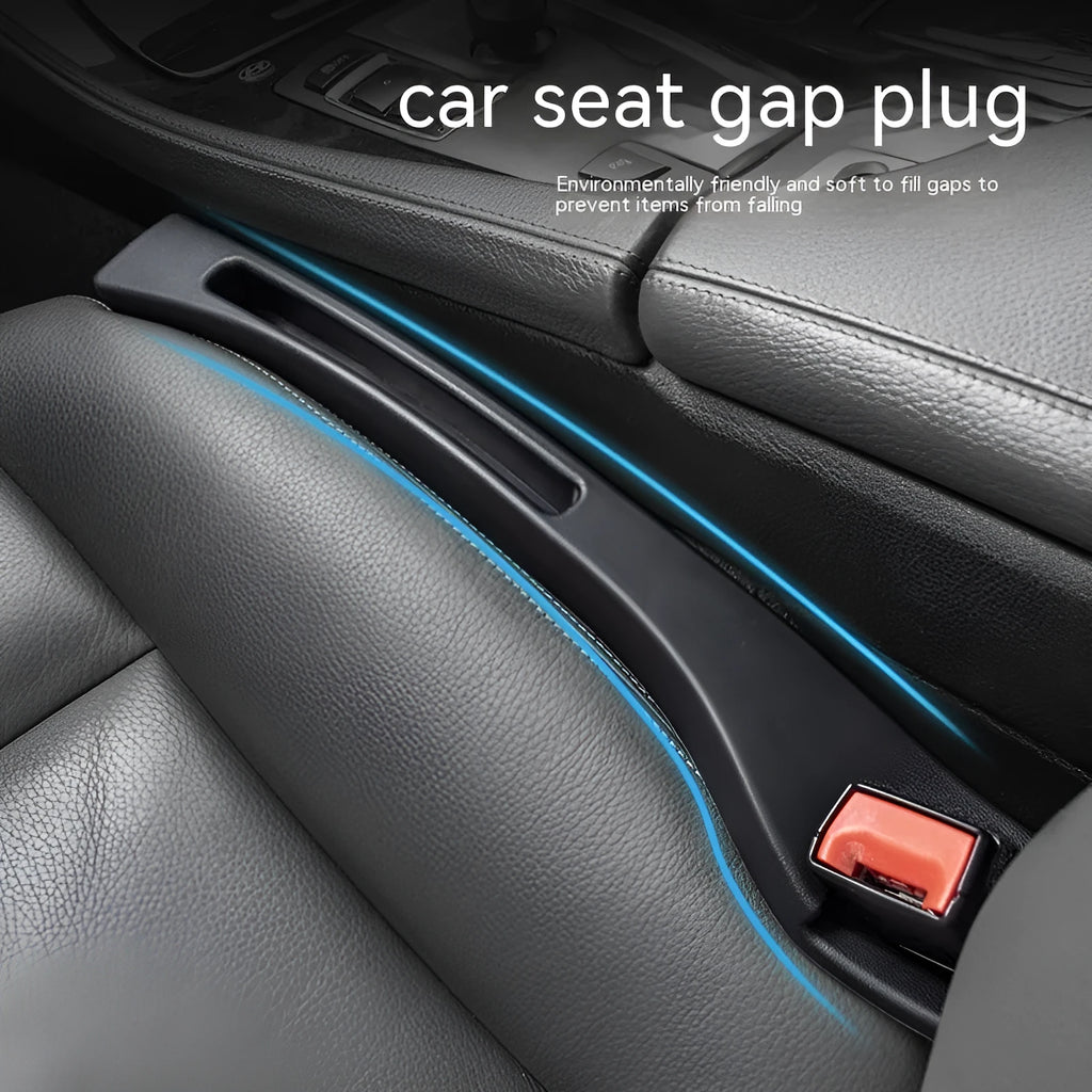 Black plastic car seat gap storage pocket with handle placed between vehicle seats.