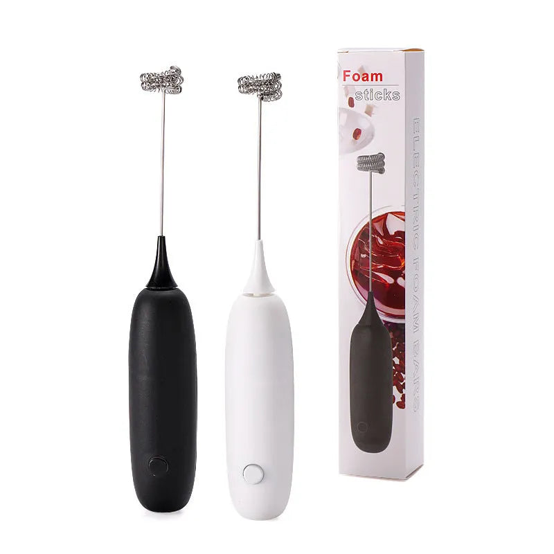 Hand-held electric milk frother in black and white colour options