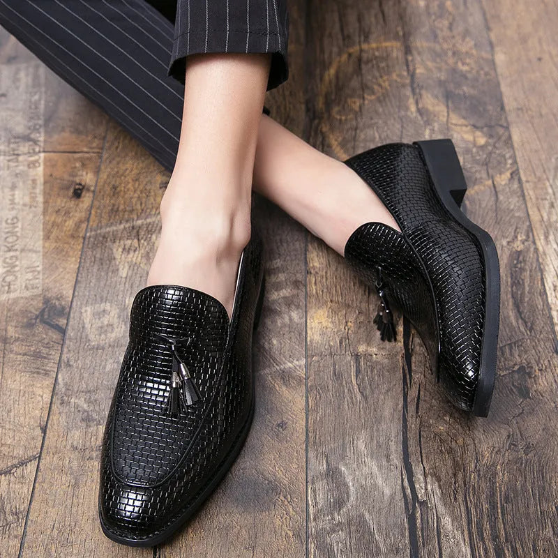 Men's black pointed toe slip on shoes with tassel decoration