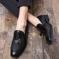 Men's black pointed toe slip on shoes with tassel decoration