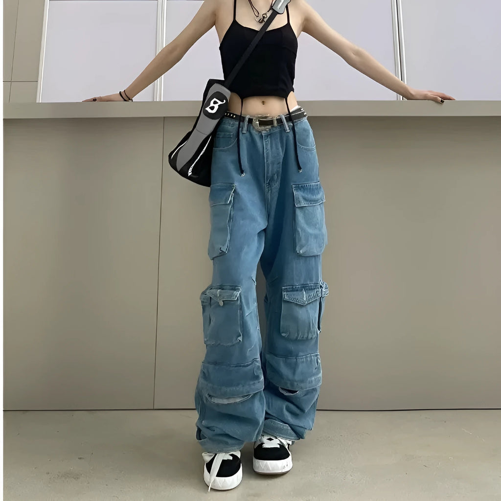 Women's blue tie-dyed high-waist wide-leg jeans with multiple pockets on a neutral background