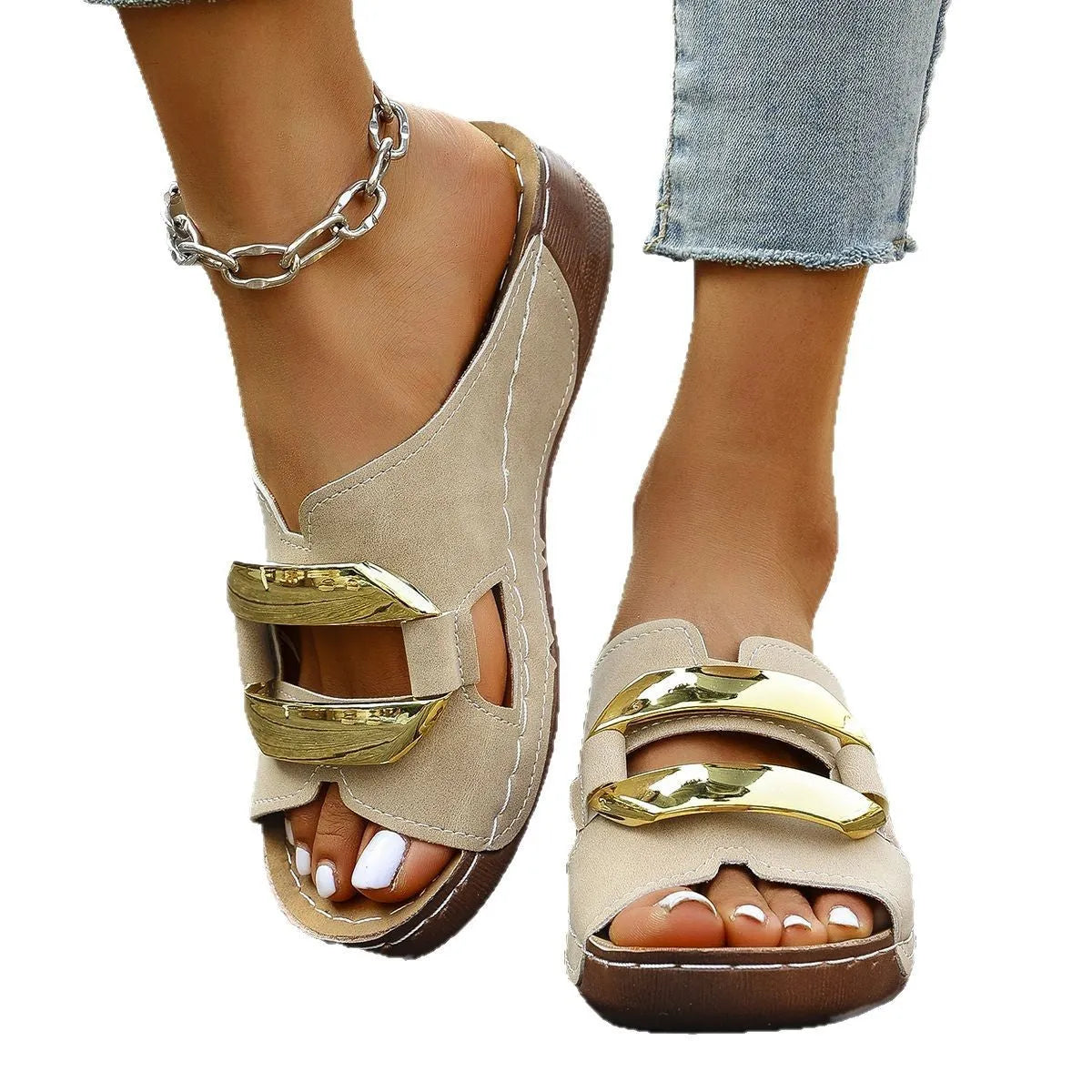 Women's white Roman style platform sandals with metal detail on a flat rubber sole.