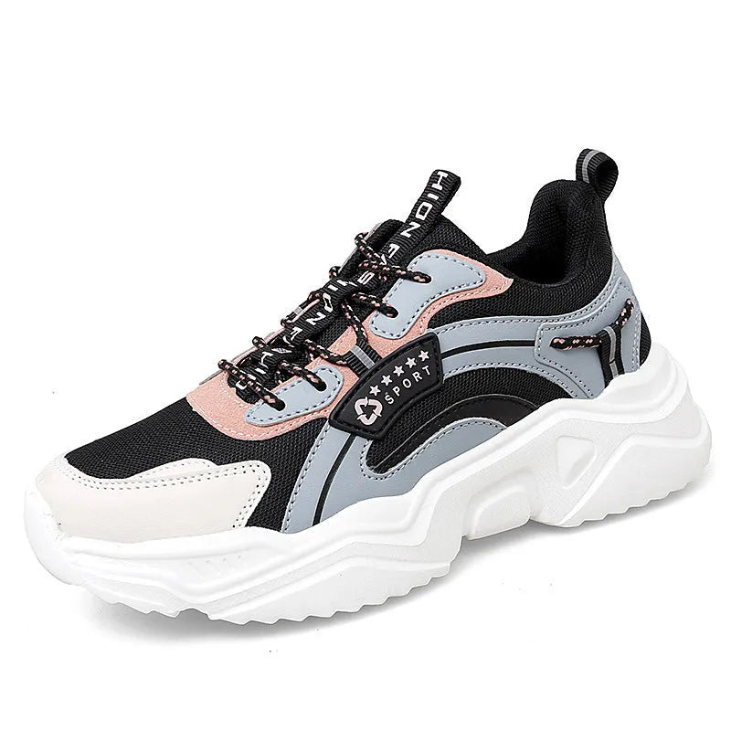 White women's casual sports shoe with mesh upper, thick PU sole, and buckle strap.