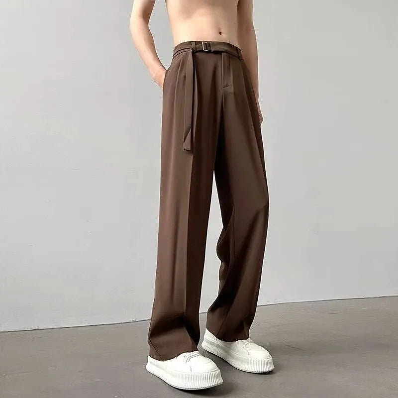 Thin straight wide leg loose fit trousers in black, showing the straight leg opening and casual drape