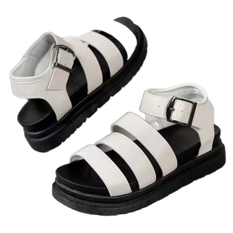 Black outdoor sandals with a thick rubber sole and adjustable buckle strap over the foot.