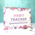 A4 habit tracking notebook in Flower White cover, open to show 12 internal pages for schedule recording.