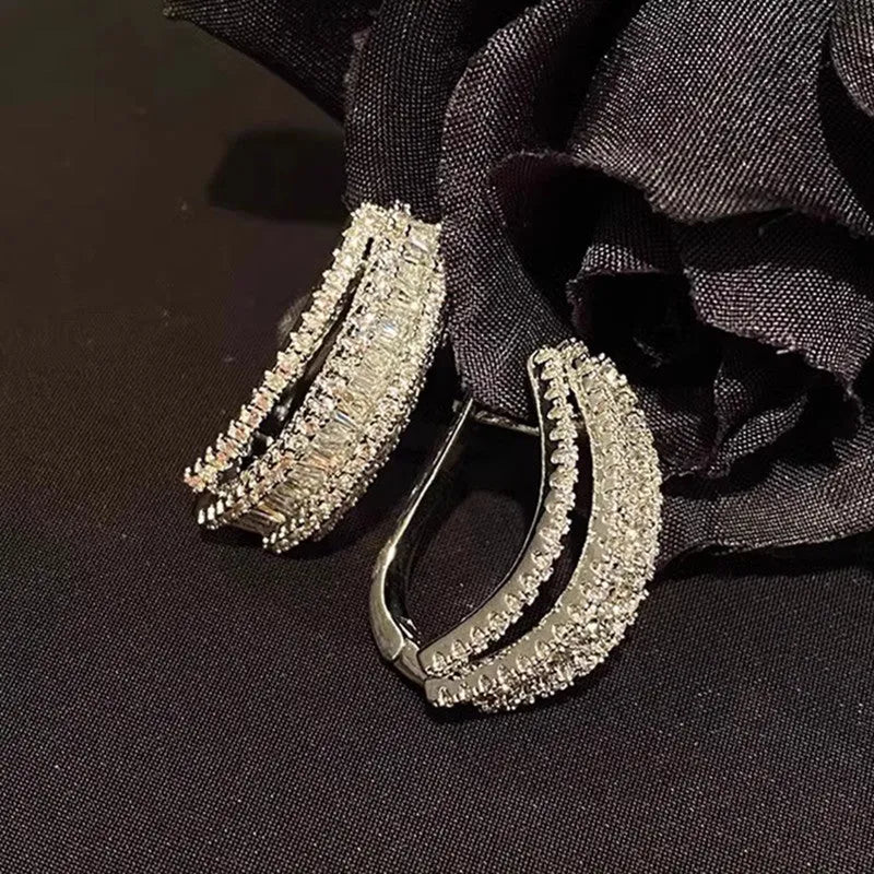 Women's geometric stud earrings with white gold colour finish and inlaid zircon stones