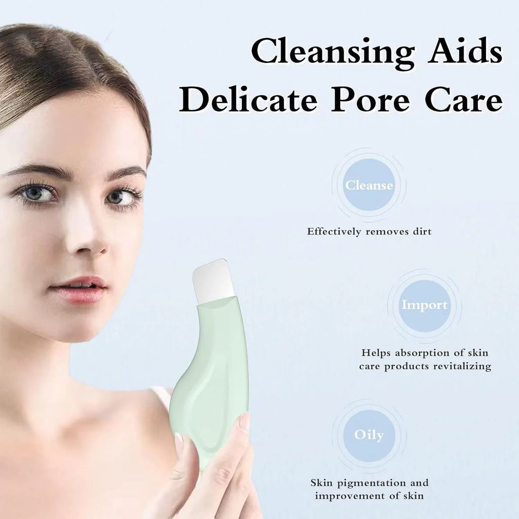 Green silicone-tipped stainless steel facial pore scraper tool with a non-slip handle.