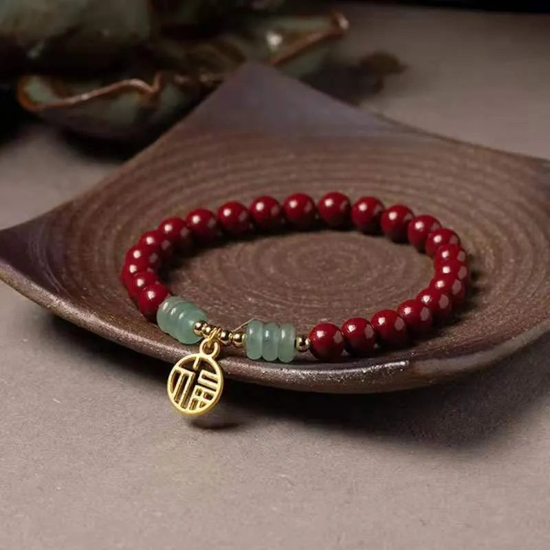 Handcrafted wave-shaped bracelet made from cinnabar and copper beads in national style
