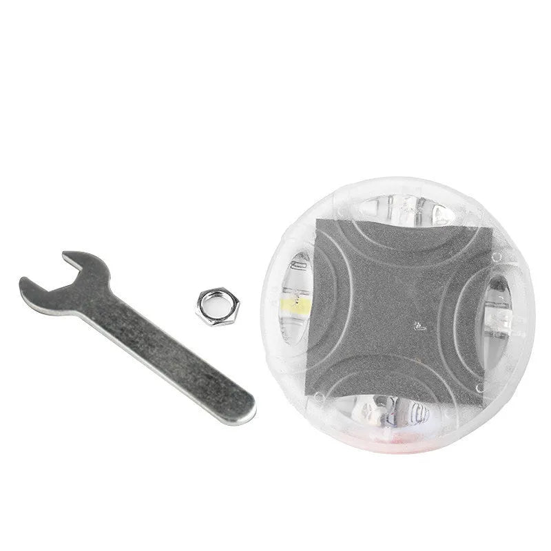 Solar-powered colourful LED valve light for mounting on a vehicle wheel hub.