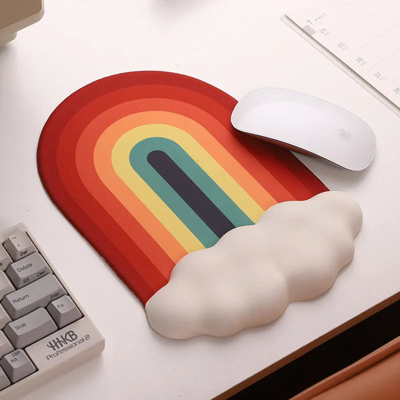 Silicone wrist rest and keyboard support mat set with printed white cloud pattern on a desk.