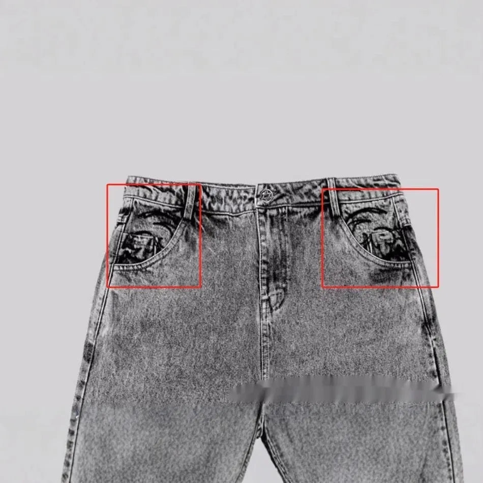 Grey loose fit straight-leg denim trousers for men and women on a mid-waist