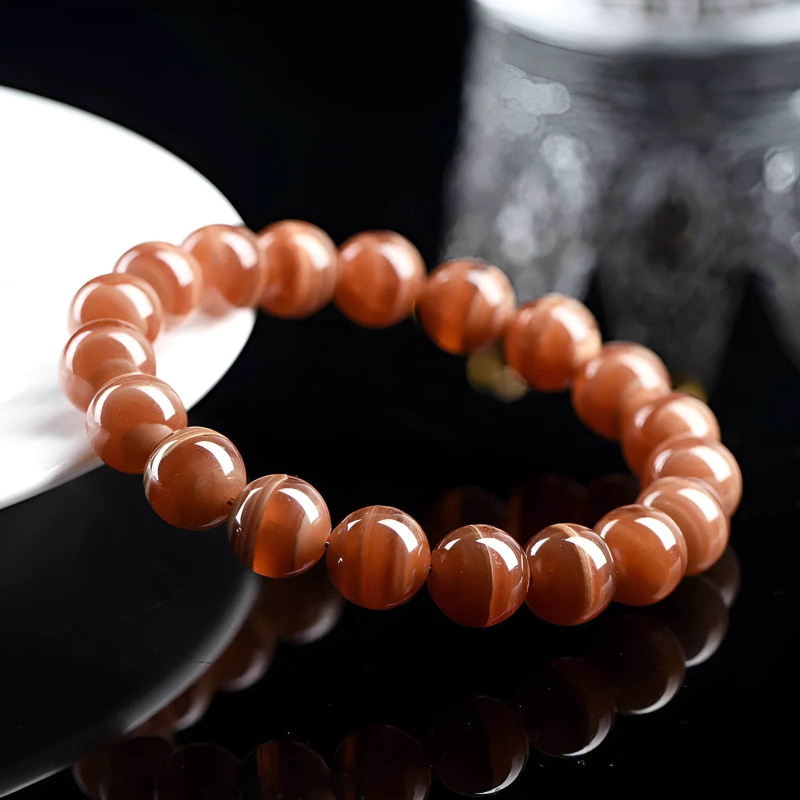 Natural old mine rhodochrosite round beads bracelet from Peru with geometric shape and Ruyi design elements