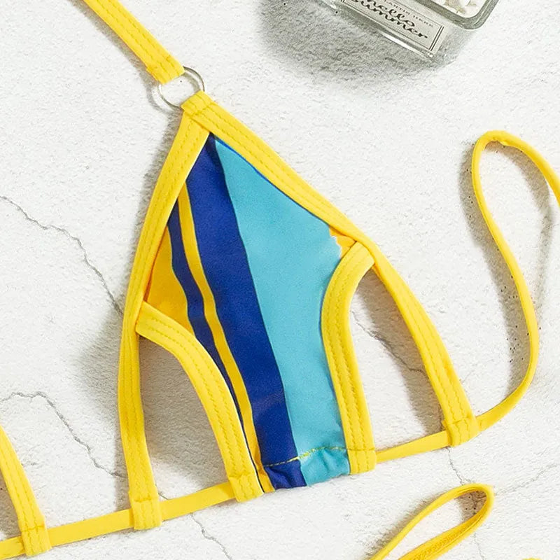 Yellow women's split swimsuit with neck-hanging style, high waist, and backless hollow design