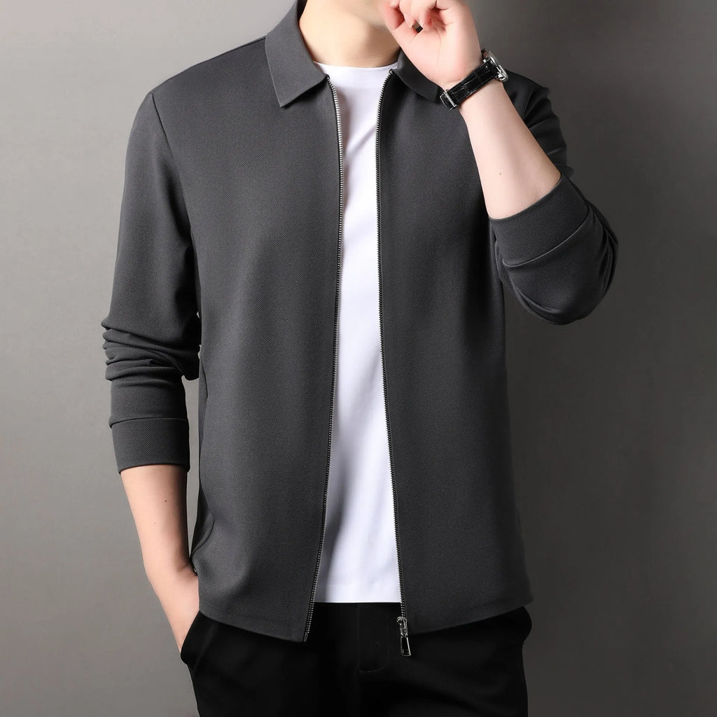 Men's jacket in polyester fabric, shown in black, dark grey, and apricot colours, featuring long sleeves and a straight hem.