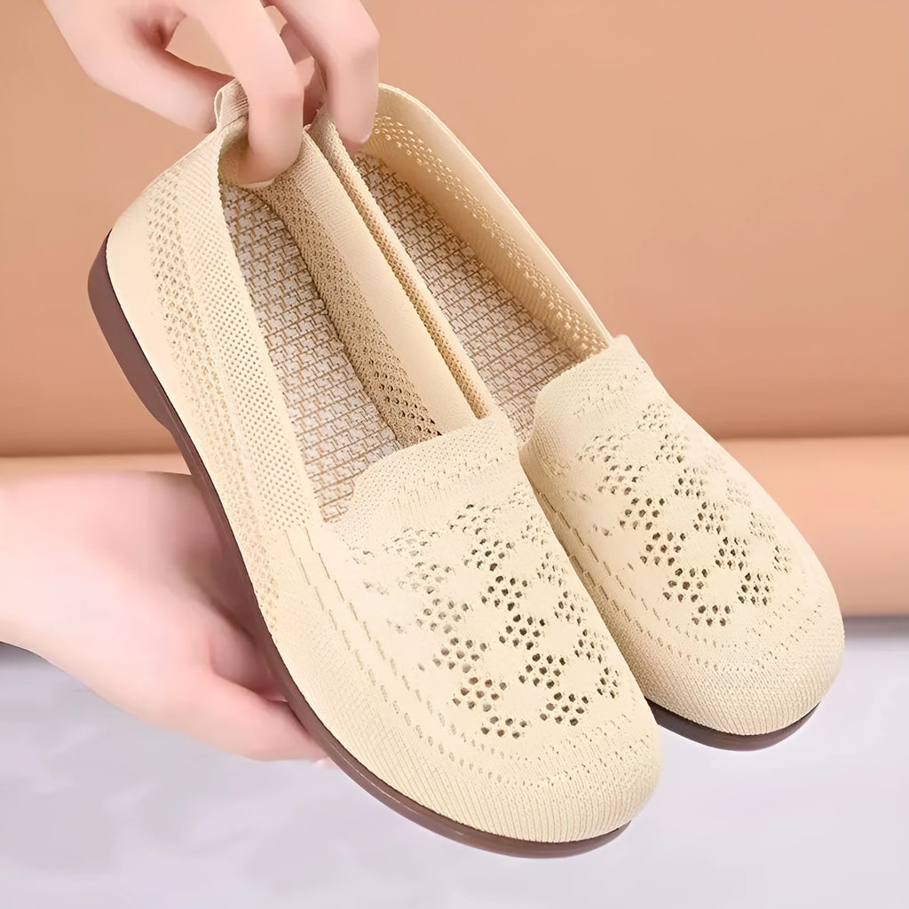 Women's beige low-top tennis shoes with mesh upper and anti-skid sole for wide feet.