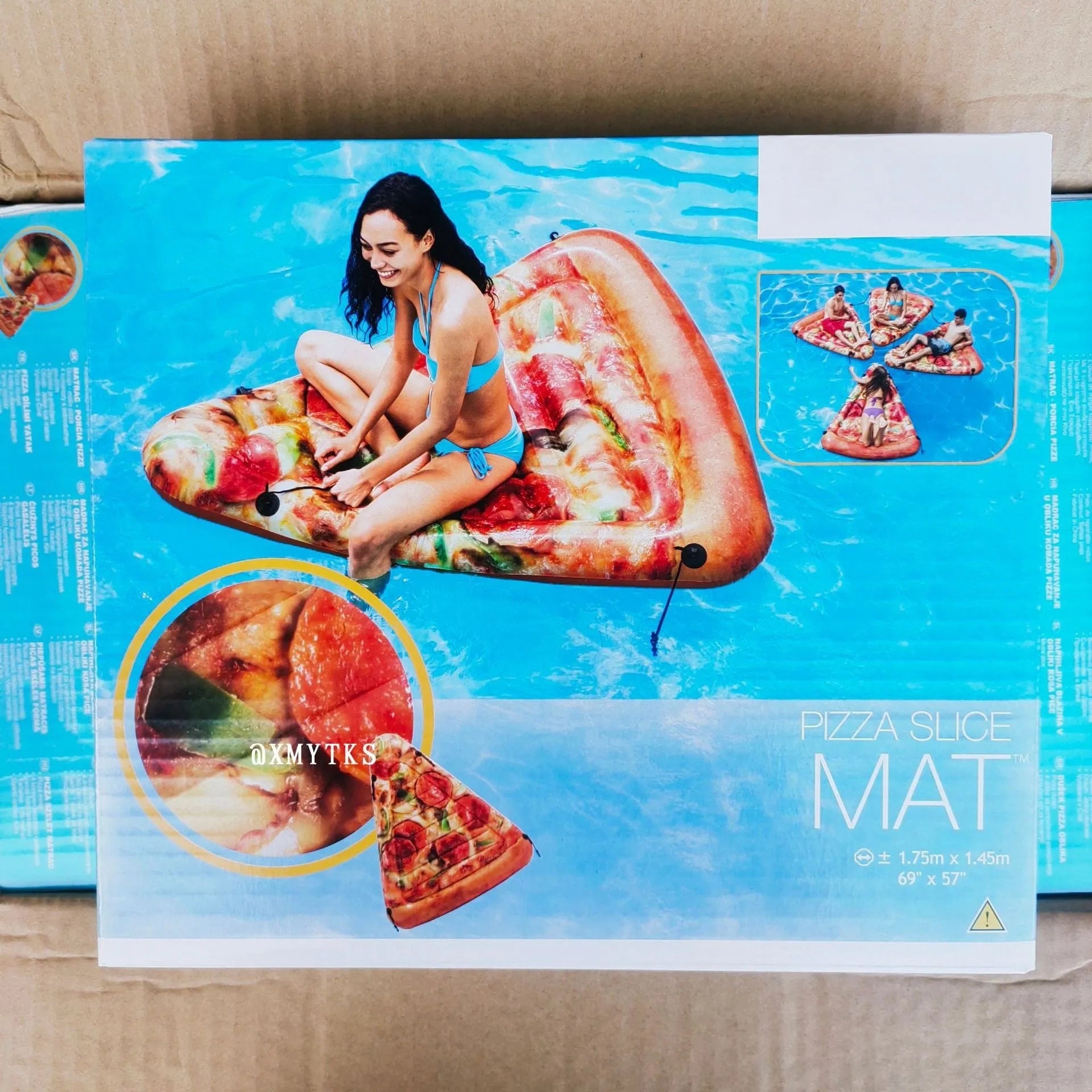 Large inflatable pizza-themed surfboard recliner floating on water, showing its 175cm length.