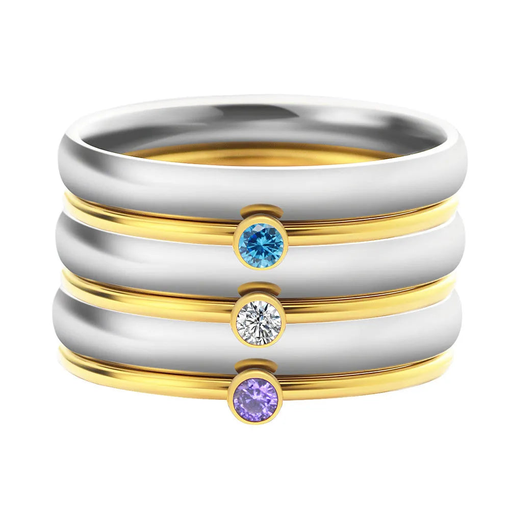 December birthstone geometric ring with gold engraved lettering on titanium steel band