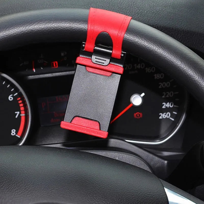 Black universal car steering wheel clip mount holder for mobile phones and GPS devices.