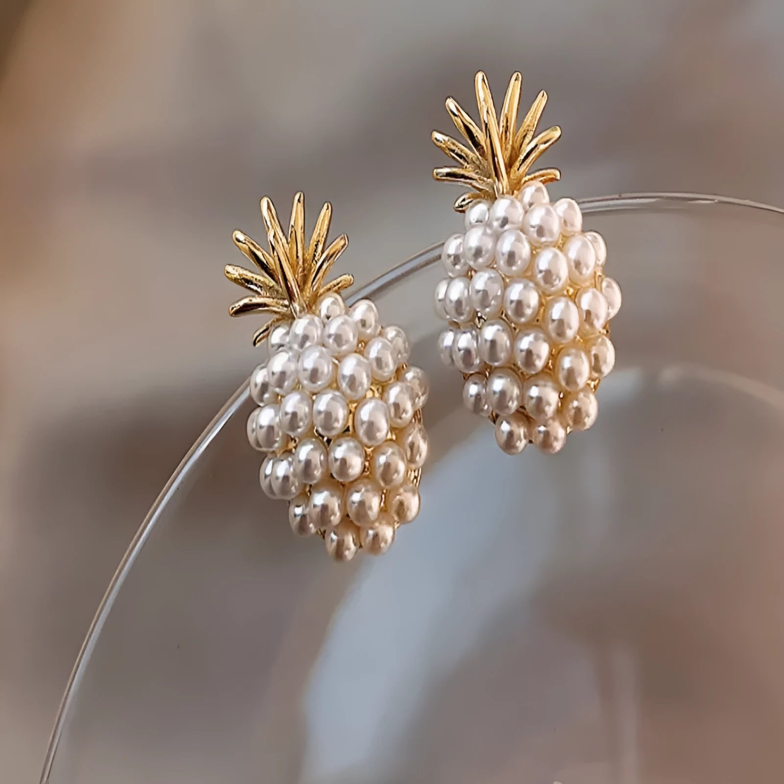 Pineapple starfish pearl earrings in Korean style with alloy construction and electroplated finish