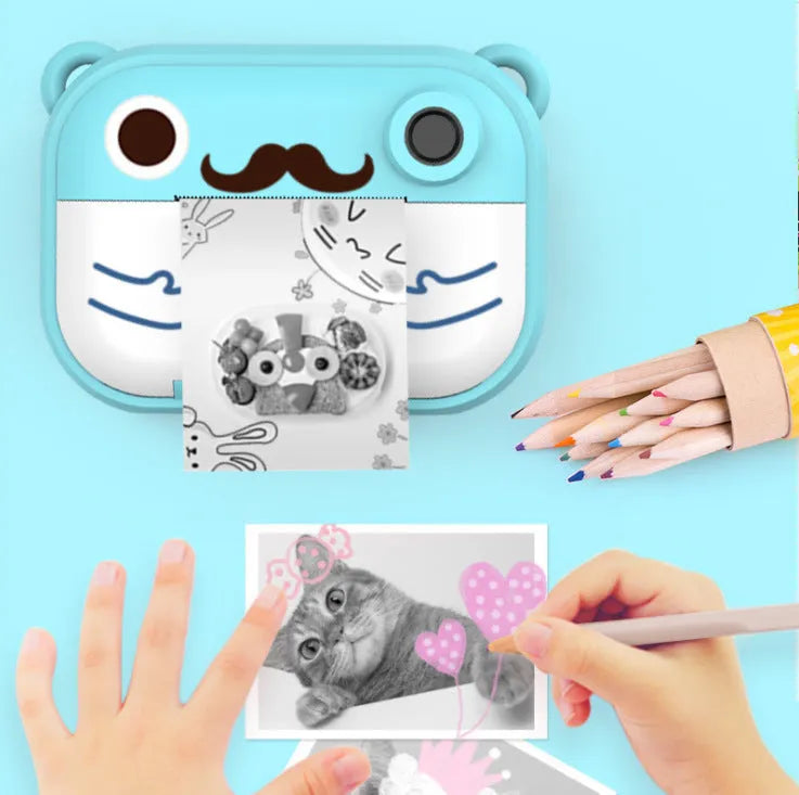 Blue, green, and pink HD digital camera model C3 with 2.4-inch screen shown with accessories